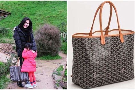 donkerblauwe goyard tas